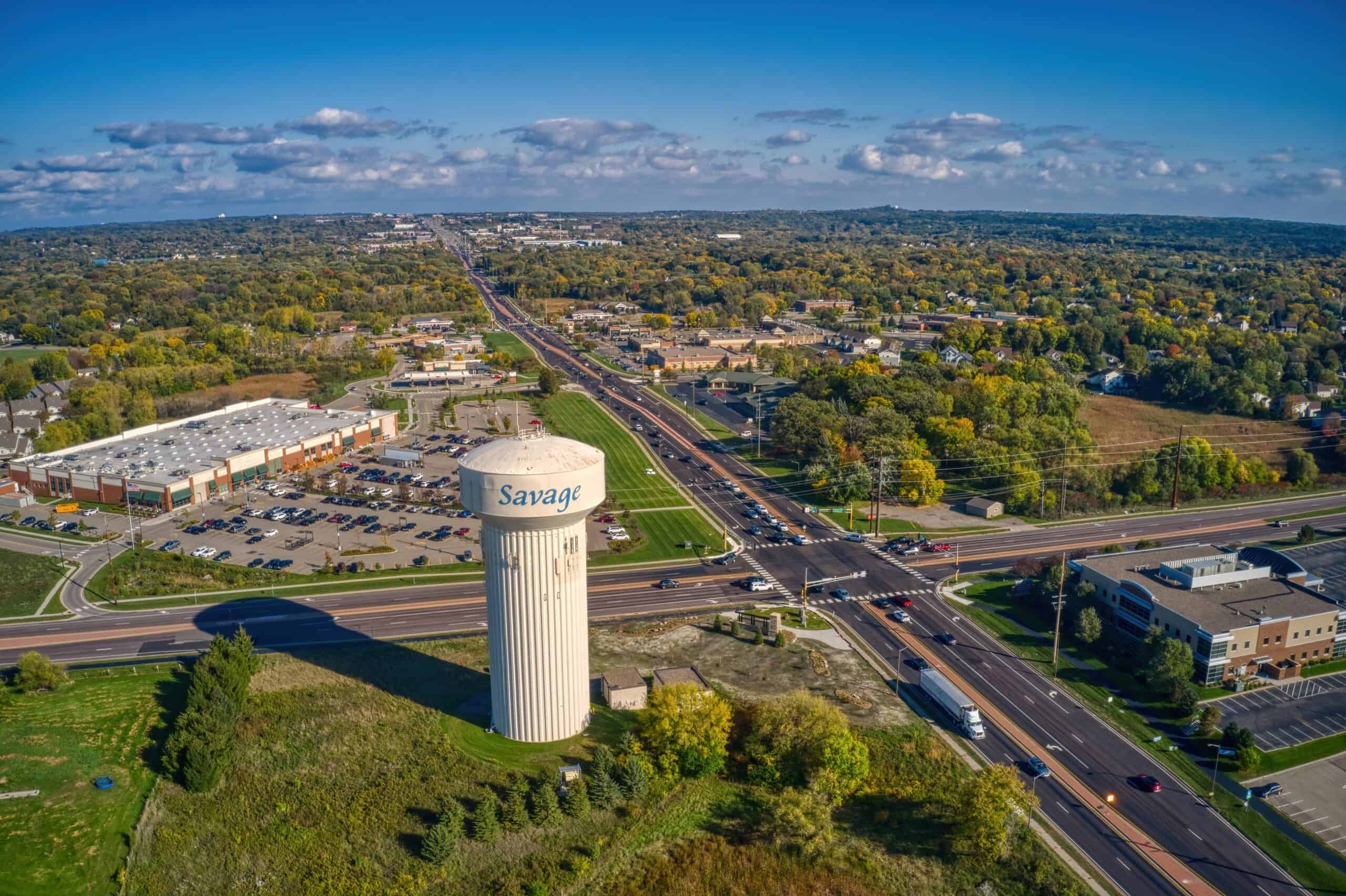 Savage, Minnesota | Aerial view of the Twin Cities Outer Suburb of Savage under a blue sky with clouds in Minnesota