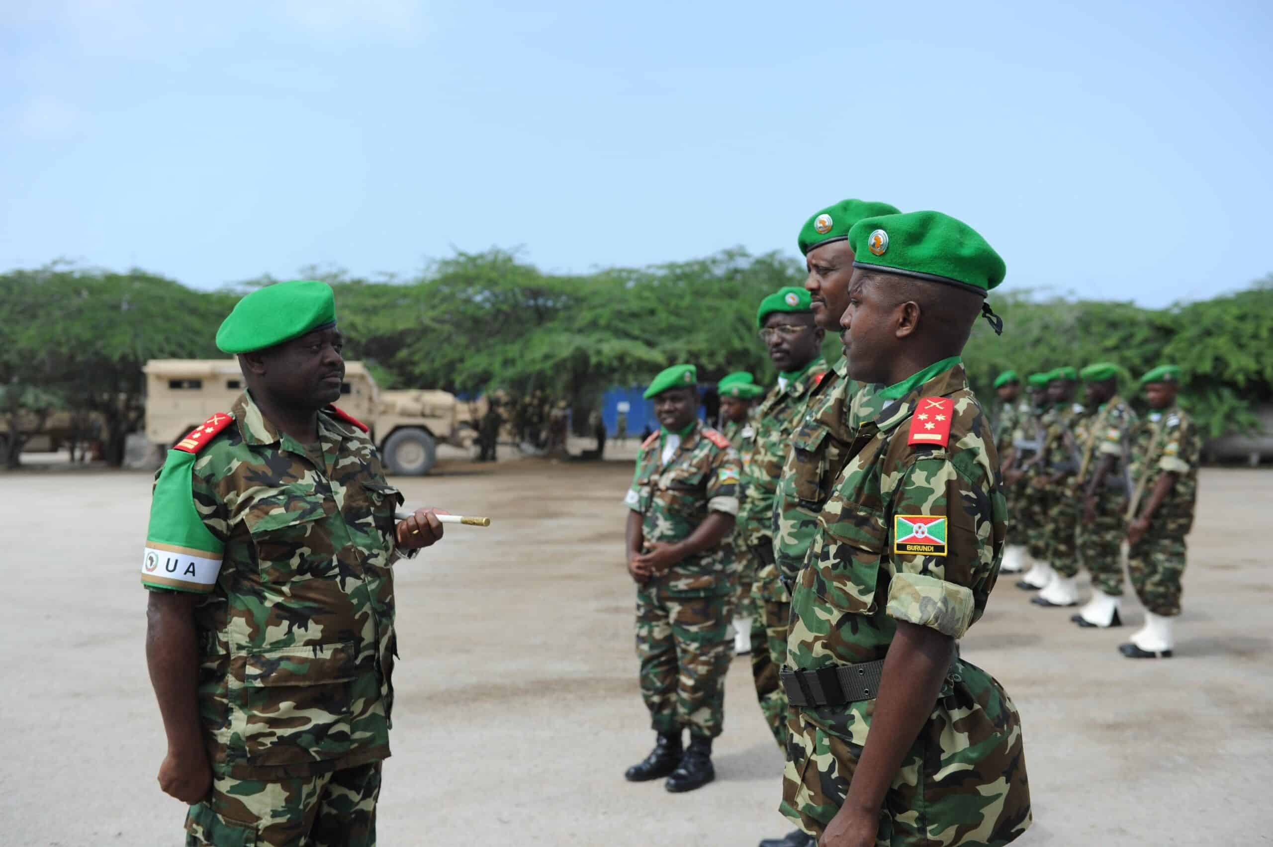 AMISOM's Force Commander, General Silas Ntigurirwa, greets officers during a ceremony to mark their rotation at Burundi's military base in Mogadishu, Somalia, on July 26. AMISOM Photo (14577825348) by AMISOM Public Information