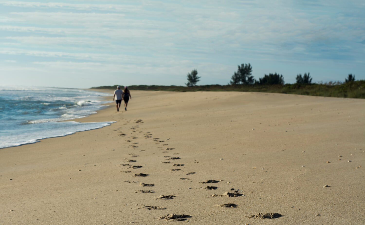 Lovers footprints in sand