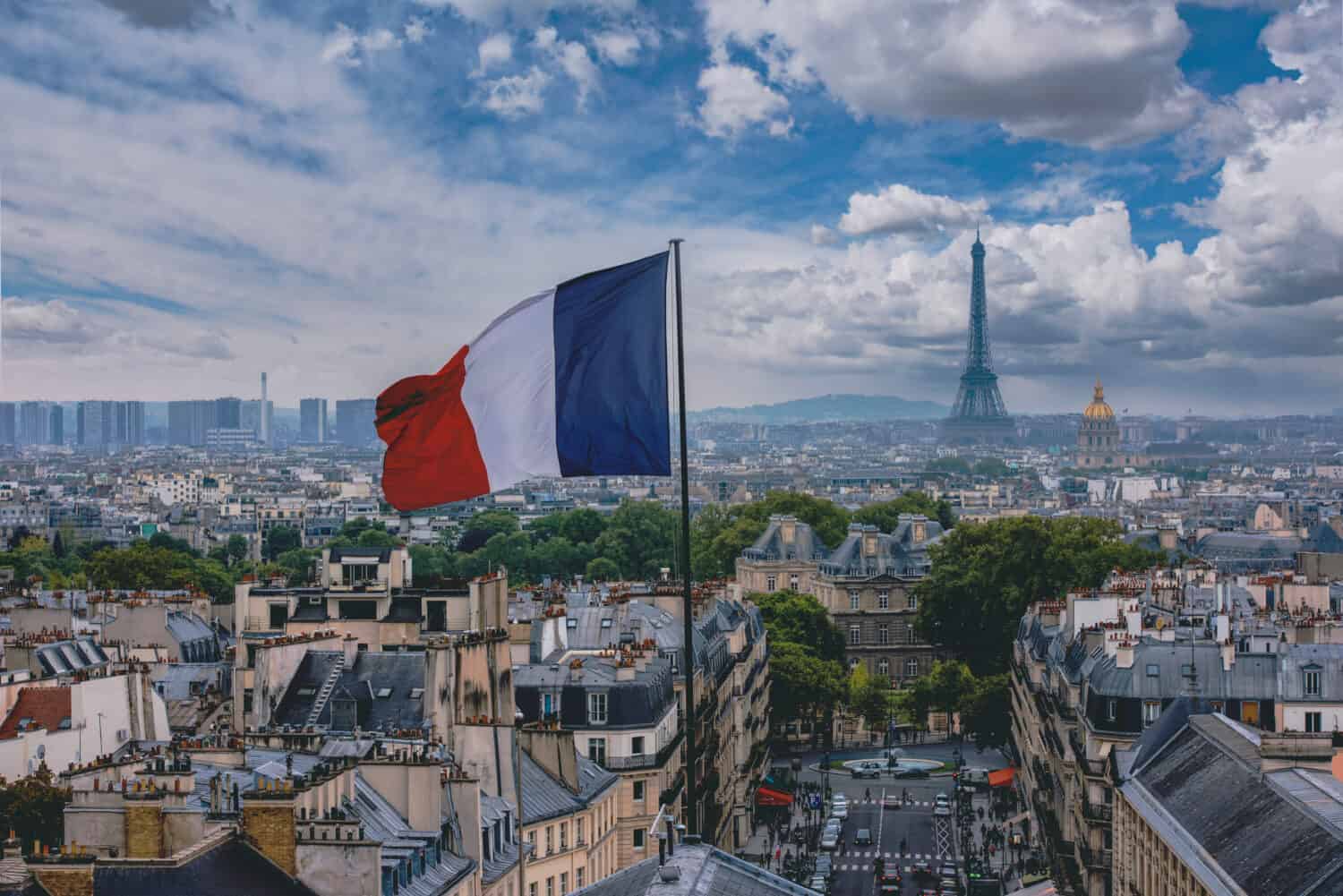 French flag and Eiffel Tower in Paris