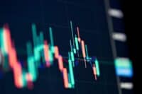 Stockmarket online trading chart candlestick on crypto currency platform. Stock exchange financial market price candles graph data pattern analysis concept. Computer screen closeup background