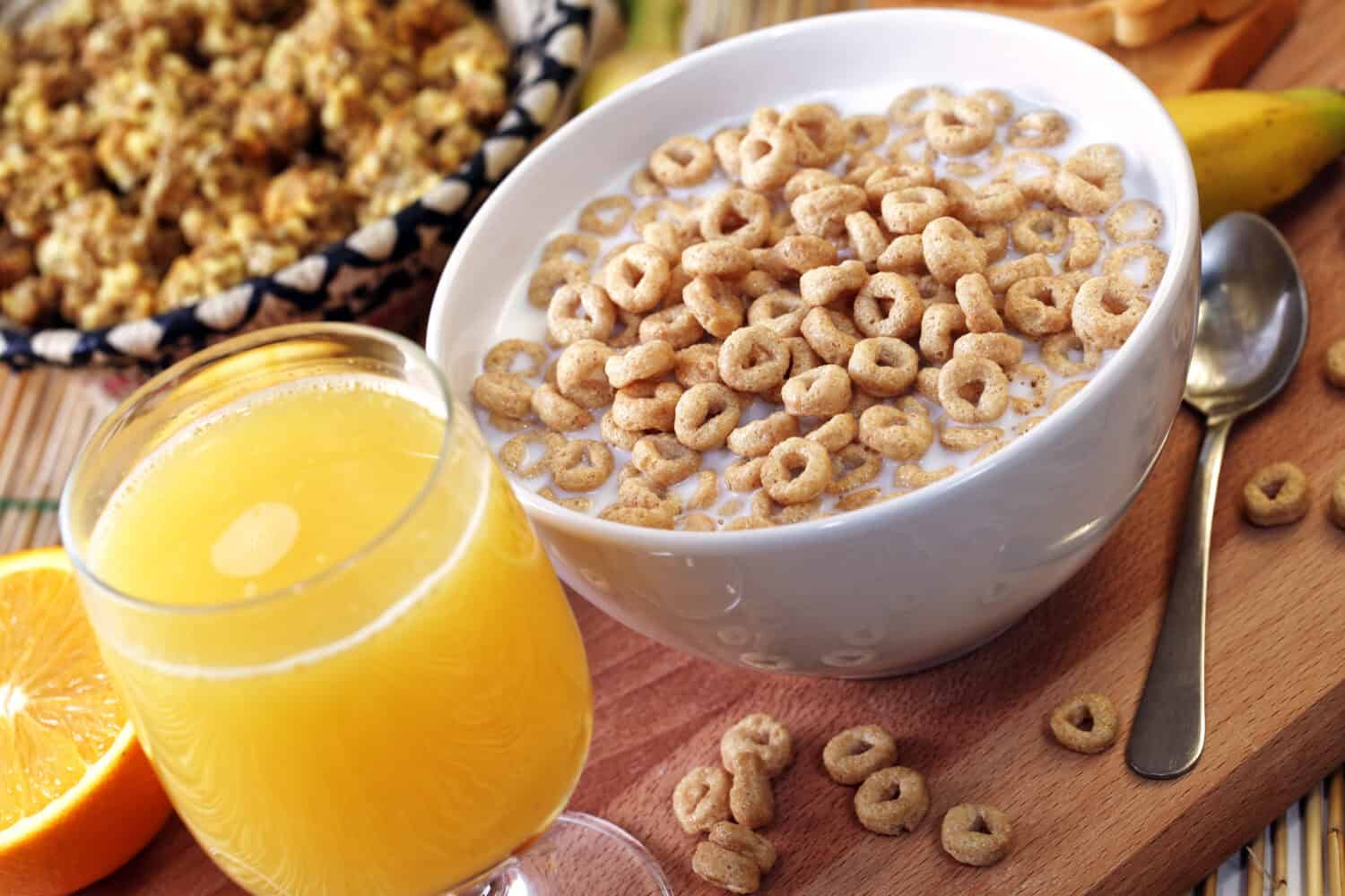 Breakfast with milk, cereals an orange juice