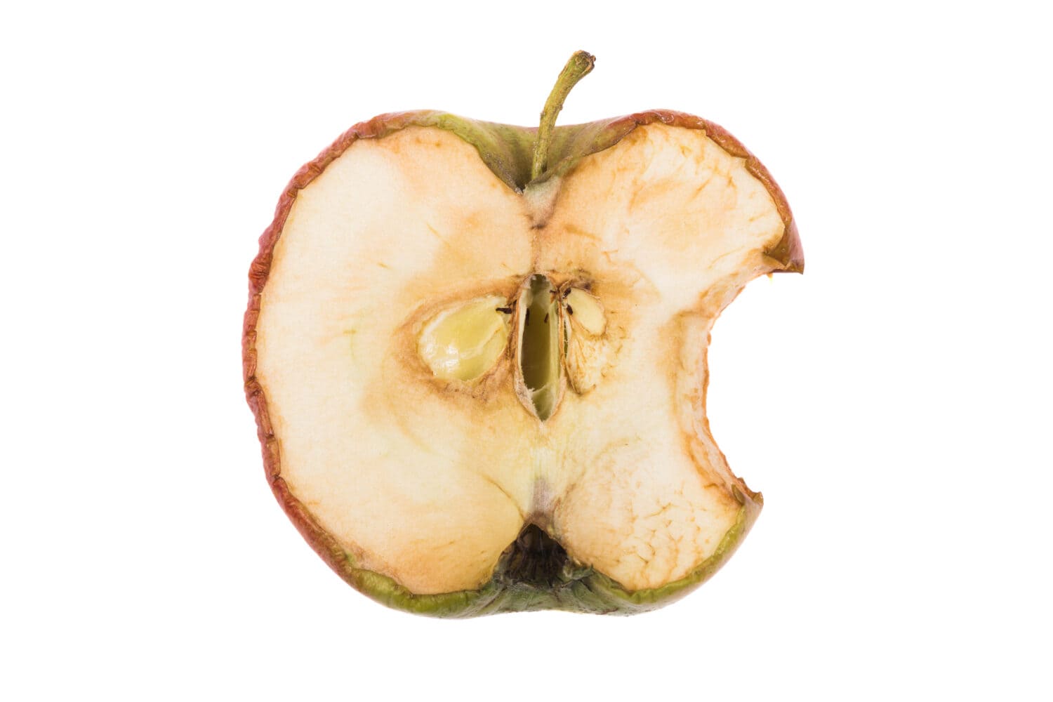 A half old apple bitten photographed on white background.