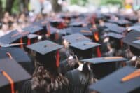 College graduates | backside graduation hats during commencement success graduates of the university, Concept education congratulation. Graduation Ceremony ,Congratulated the graduates in University during commencement.