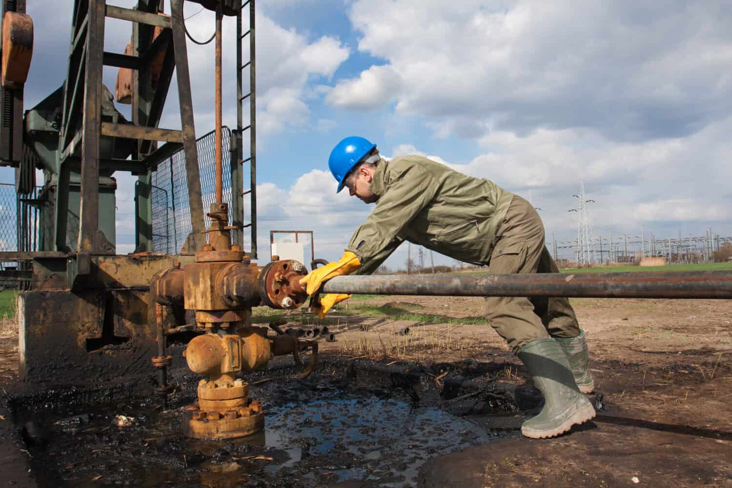 Oil worker check oil pump