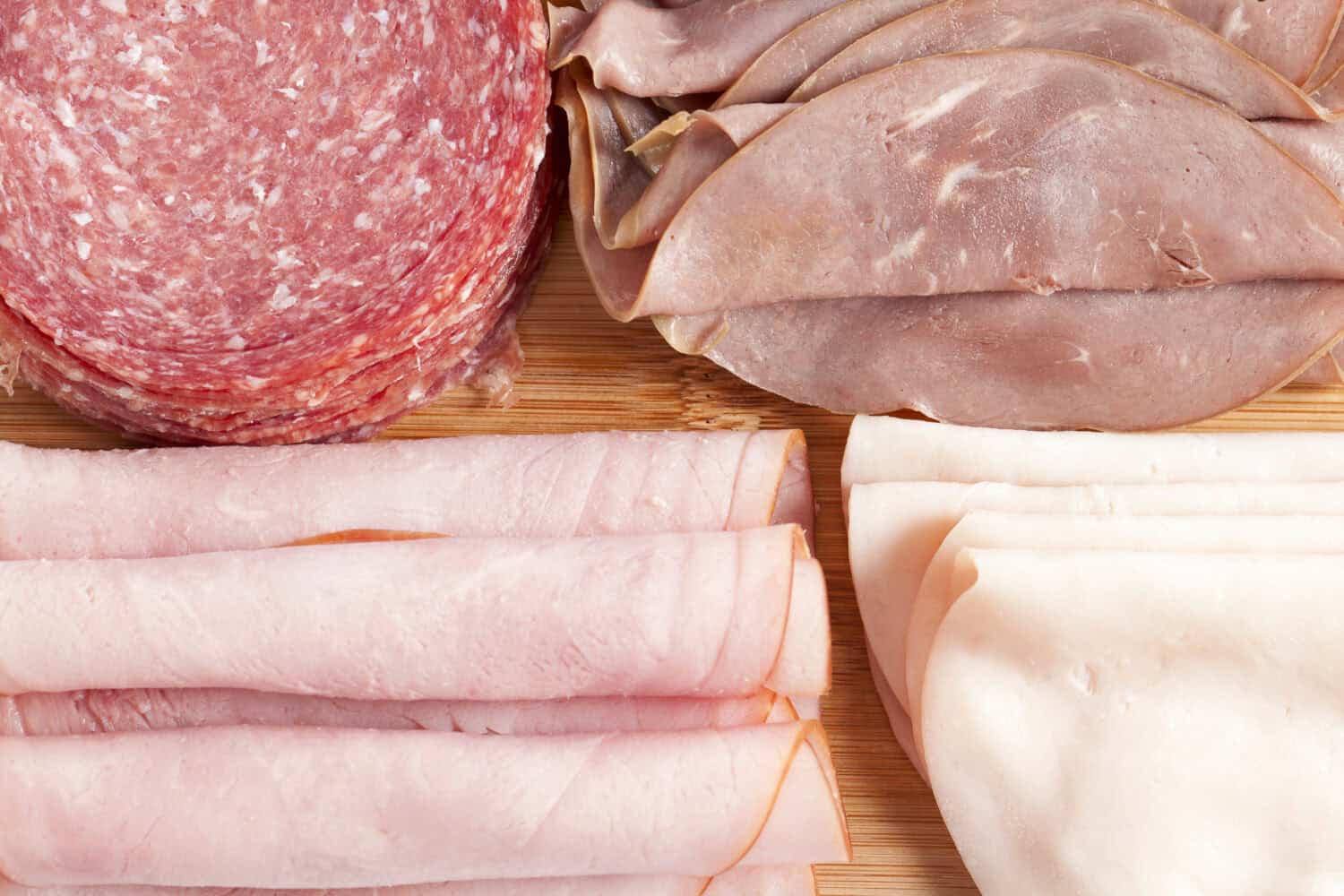 Assorted sliced meat in a macro image