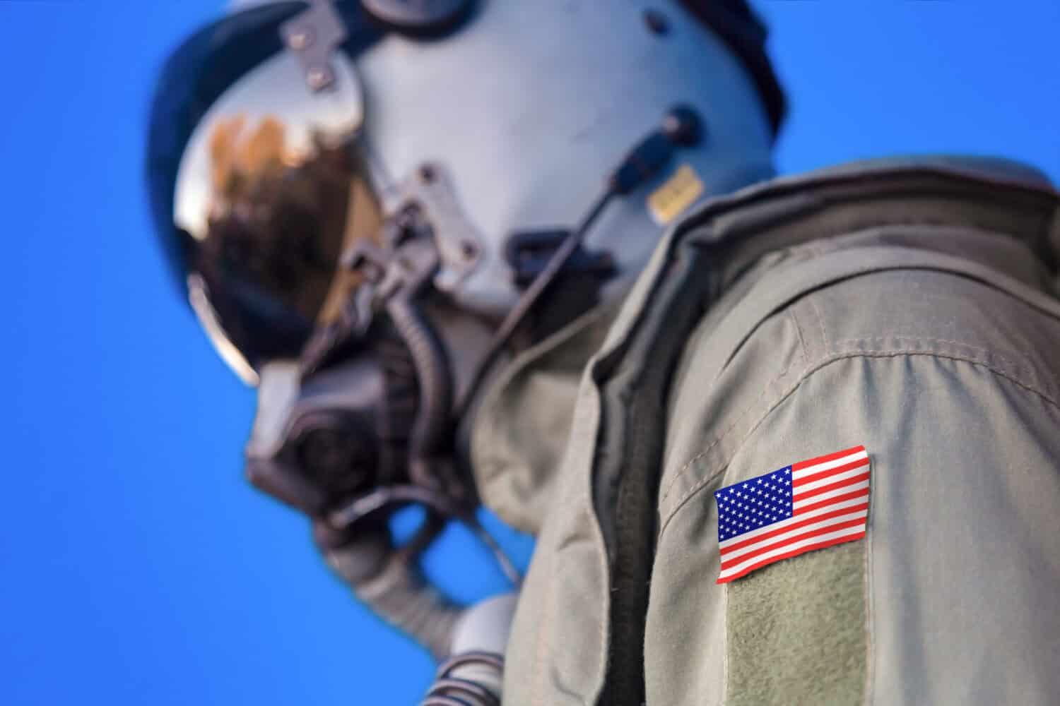 United States jet aircraft pilot flight suit uniform with American flag patch.