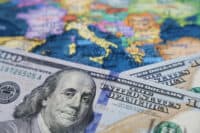 US dollars on the map of Europe. American investment and trading with EU, european economy