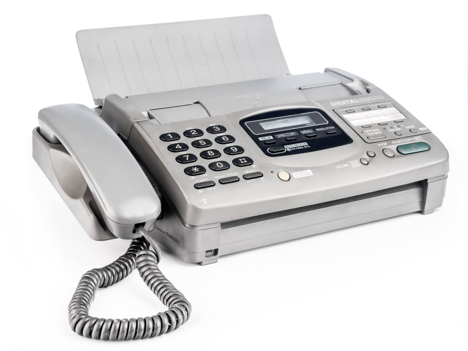Old office fax machine shot on white background