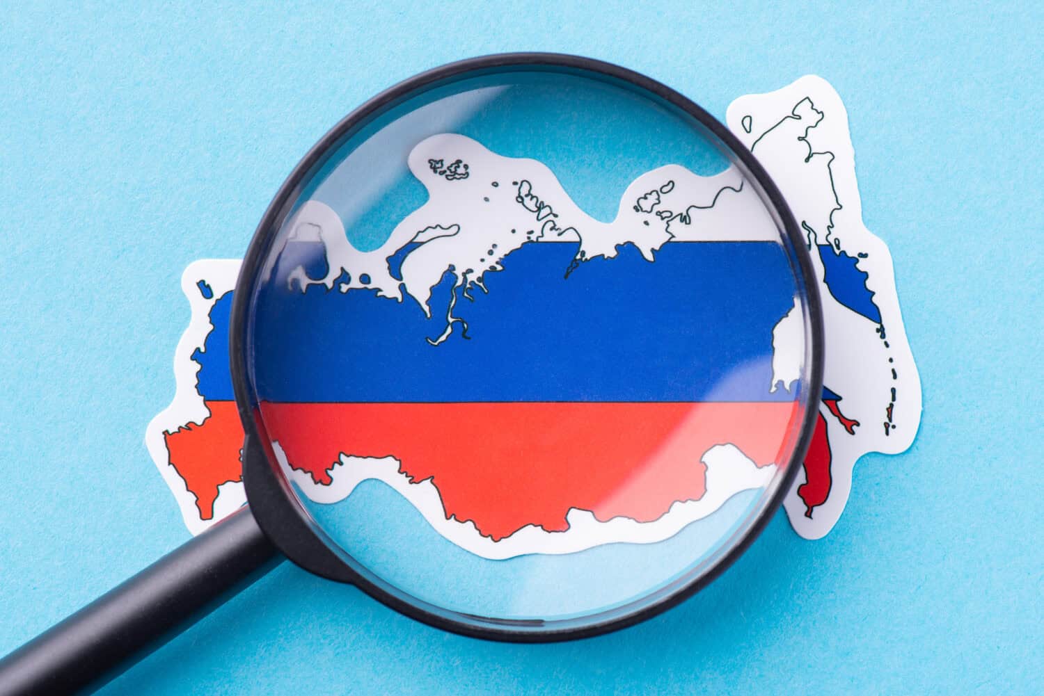 Magnifying glass on the map of Russia. Studying Russian Federation, interesting facts, event, dates connected with Russia
