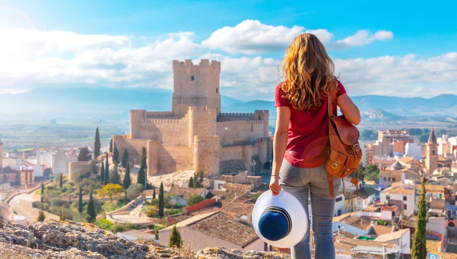 Woman tourist travel in Spain, Andalusia- Villena castle- Alicante