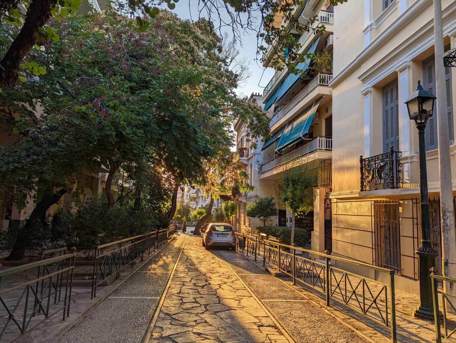 Beautiful Streets of Athens Full of Plants at Sunset on a Summer Day