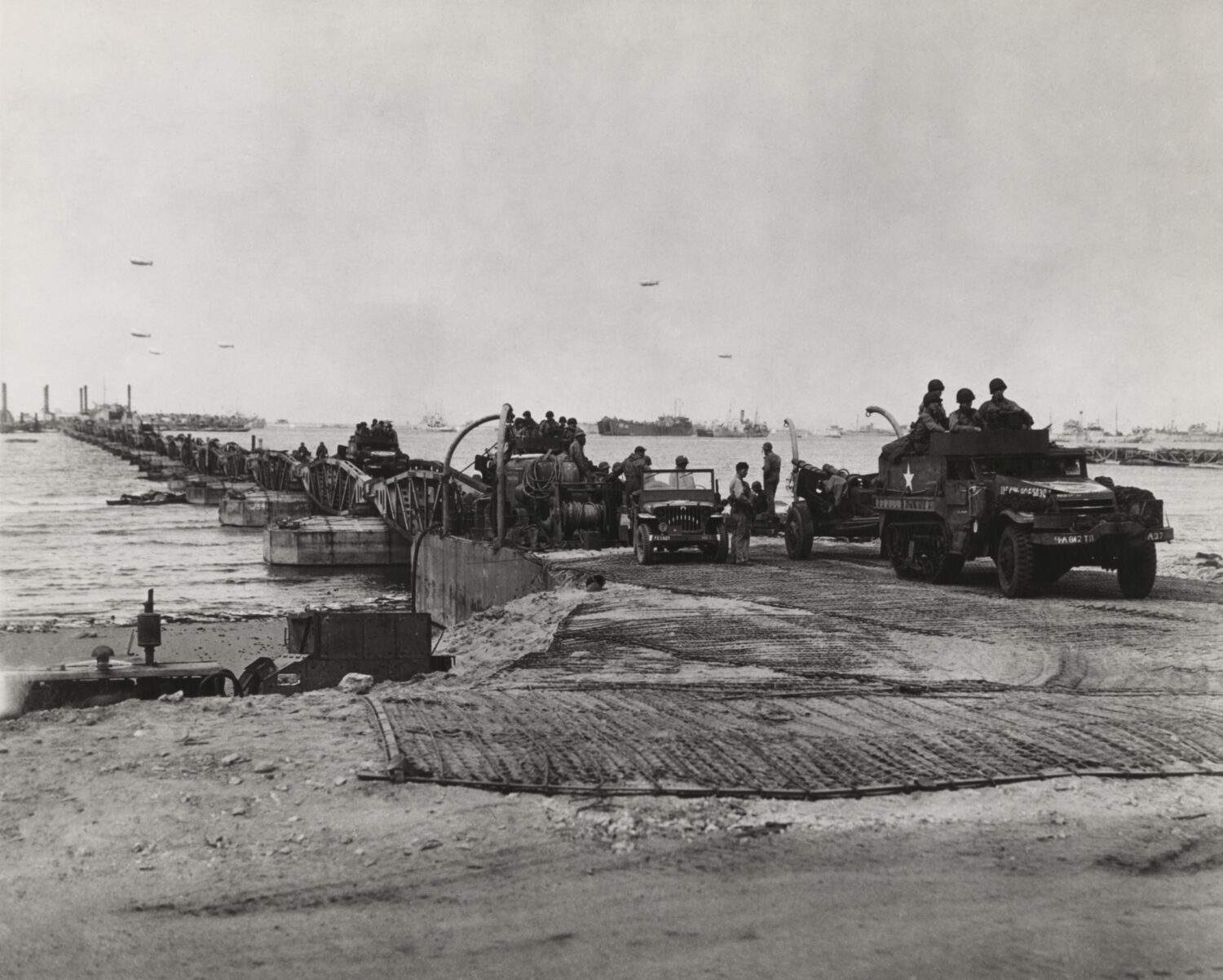 Mulberry harbor developed for the D-Day invasion of Normandy. Installed on Omaha beach after D-Day, the a steel roadway was supported by prefabricated concrete caissons.