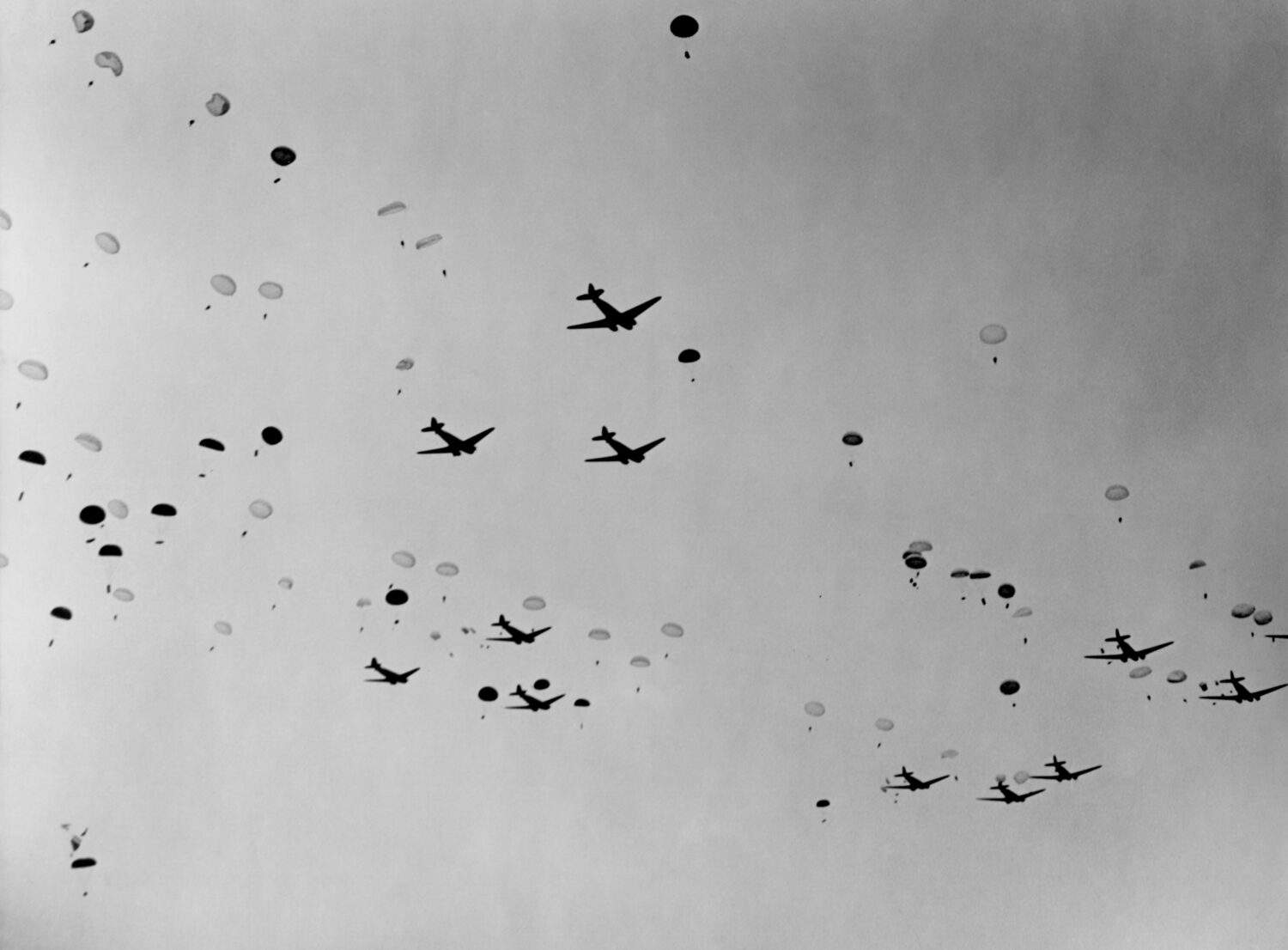 Douglas C-47s were the backbone of WW2 Airborne assault operations. Photo shows a parachute drop initiating Operation Dragoon, the Allied invasion of southern France. August 15, 1944.