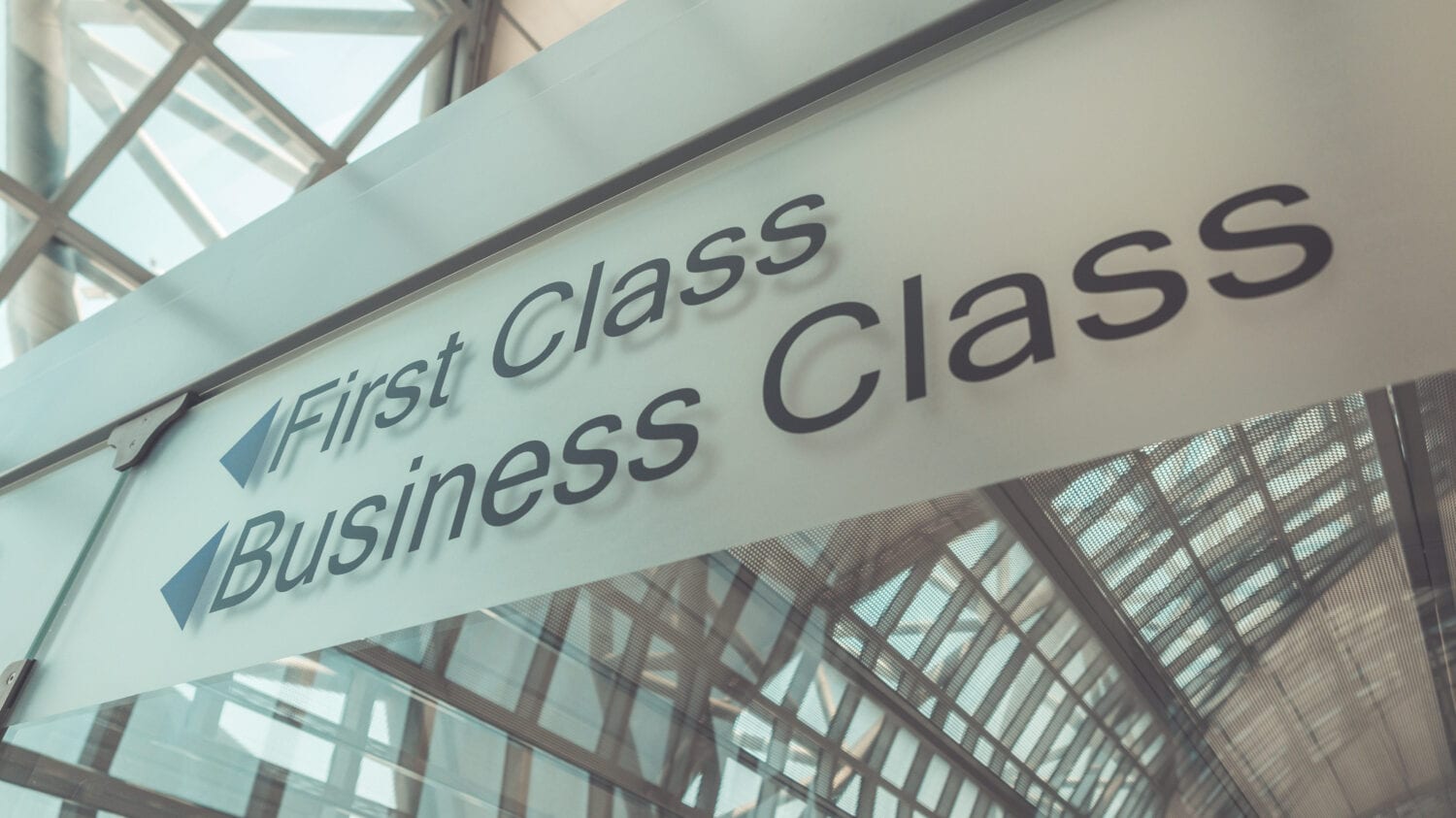 First Class and Business Class sign at the airport. (Vintage Style)