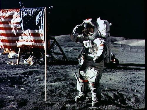 Astronaut Eugene Cernan salutes deployed U.S. flag on lunar surface by NASA Goddard Photo and Video
