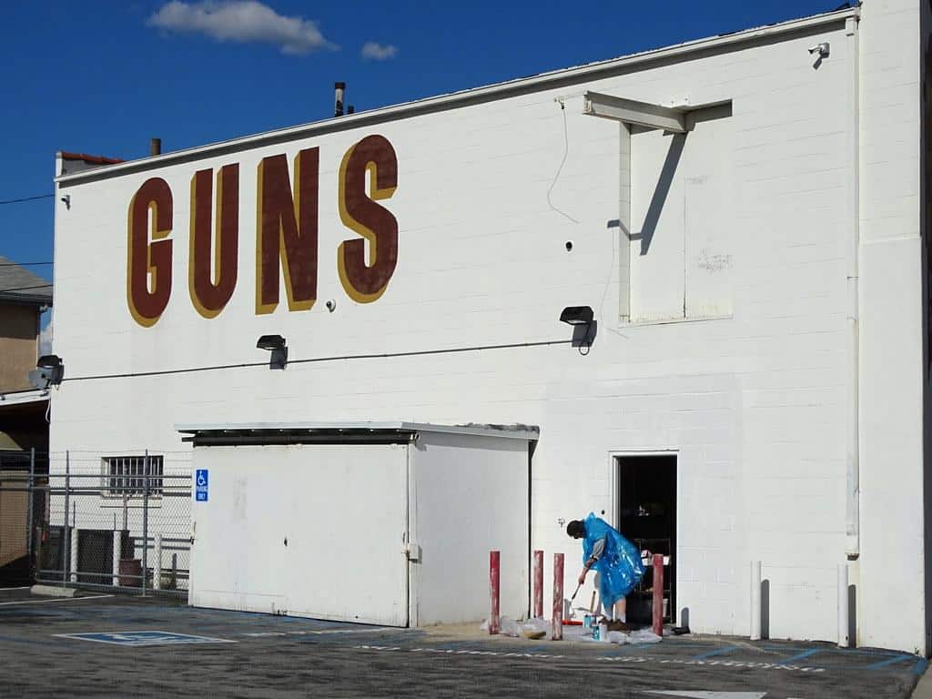 Man Cleaning outside Guns Store - Culver City - Los Angeles - California - USA by Adam Jones, Ph.D. - Global Photo Archive