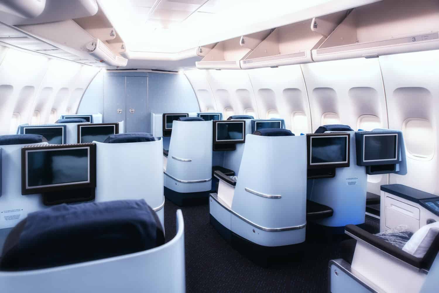 Airplane cabin business class interior view.