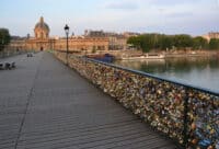 The hundreds of thousands of romantically love inscribed padlocks on the Pont Des Arts Bridge, Paris France.