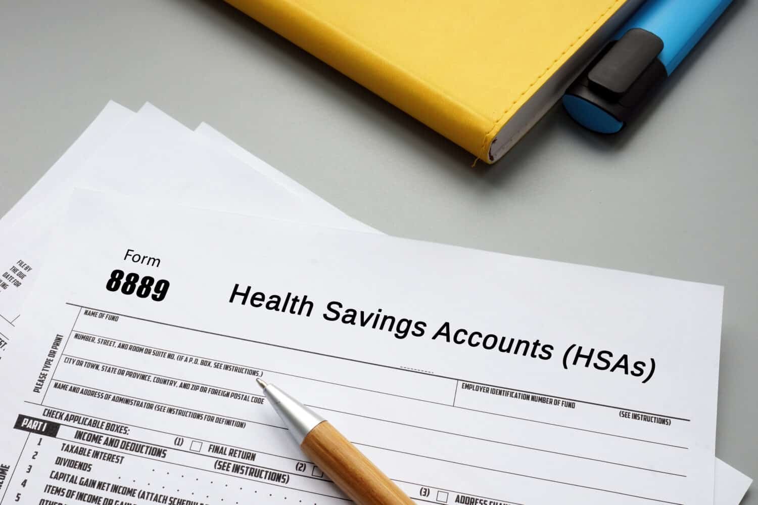 Financial concept meaning Form 8889 Health Savings Accounts (HSAs) with inscription on the sheet.