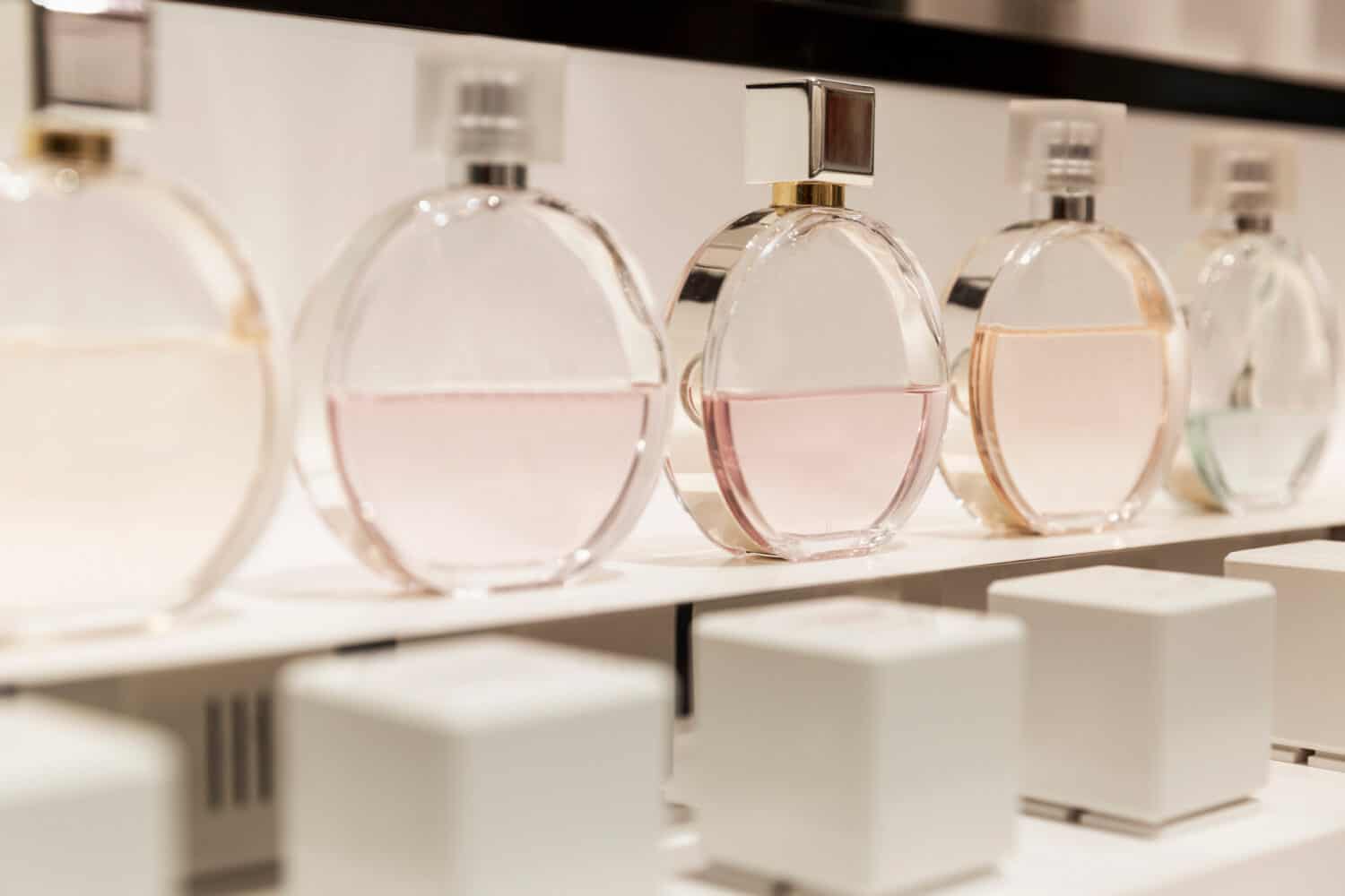 Chanel perfume bottles on the counter. Elegance and style. Close-up.