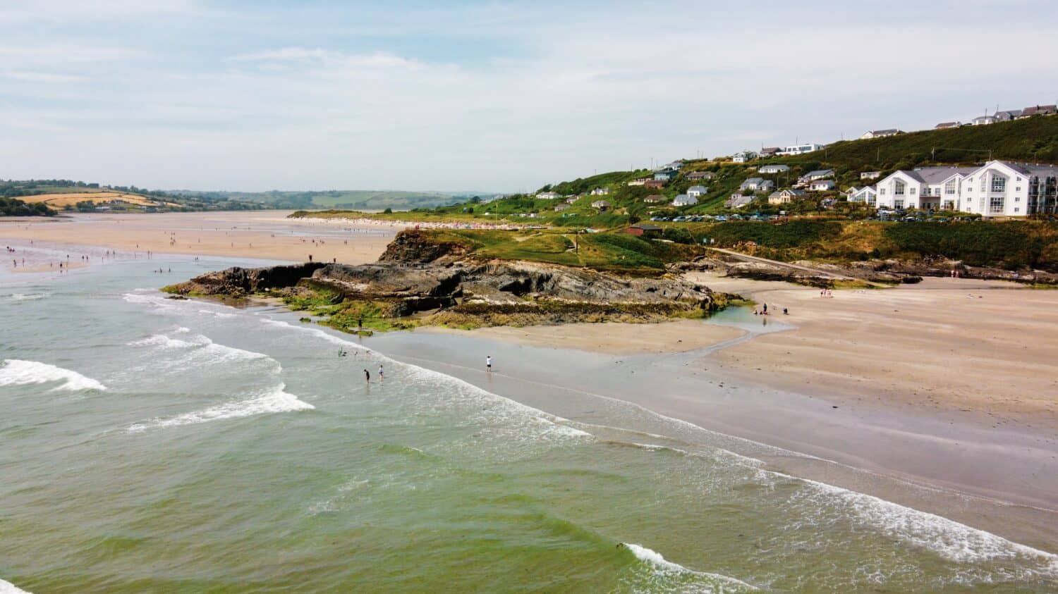 cliff on the coast of Ireland. Virgin Mary headland. Inchydoney is a small island off West Cork, Ireland. The nearest town is Clonakilty. It has a Blue Flag beach.