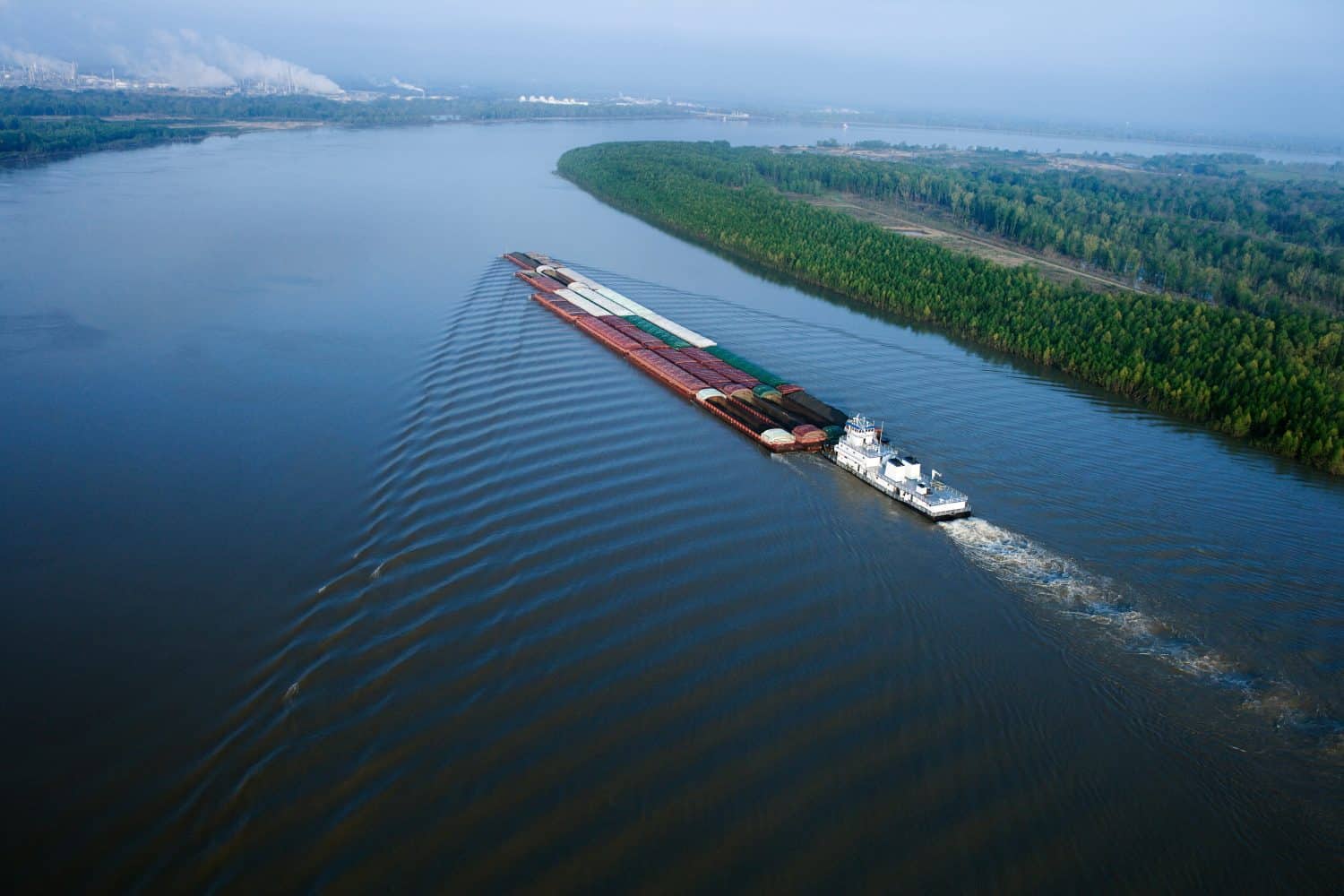 Aerial of a barge on the Mississippi River in Baton Rouge, Louisiana.