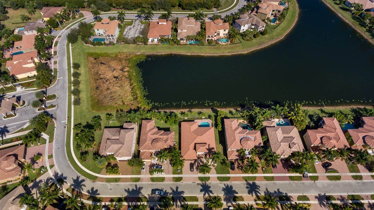 WELLINGTON, FL, USA: Aerial view showing neighborhood and lake.