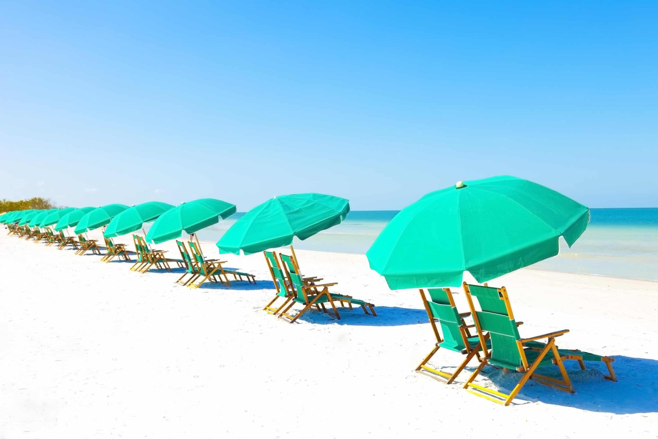 Sanibel, Florida | Lounge Chairs and Umbrella at the Beach