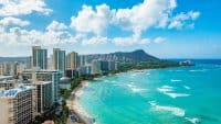 Hawaii | Waikiki Beach and Diamond Head Crater including the hotels and buildings in Waikiki, Honolulu, Oahu island, Hawaii. Waikiki Beach in the center of Honolulu has the largest number of visitors in Hawaii