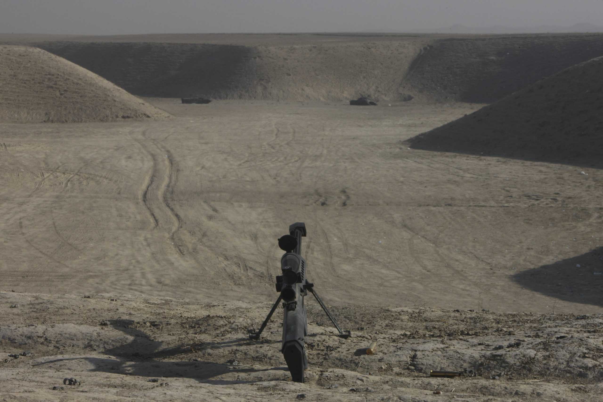 The Barrett M82A1 sniper rifle and spent cartridges on a wadi in northern Afghanistan.