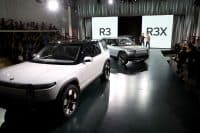 Tesla’s Margin Expansion vs. Rivian’s R2 Bet: Two Paths to EV Dominance, One Winner