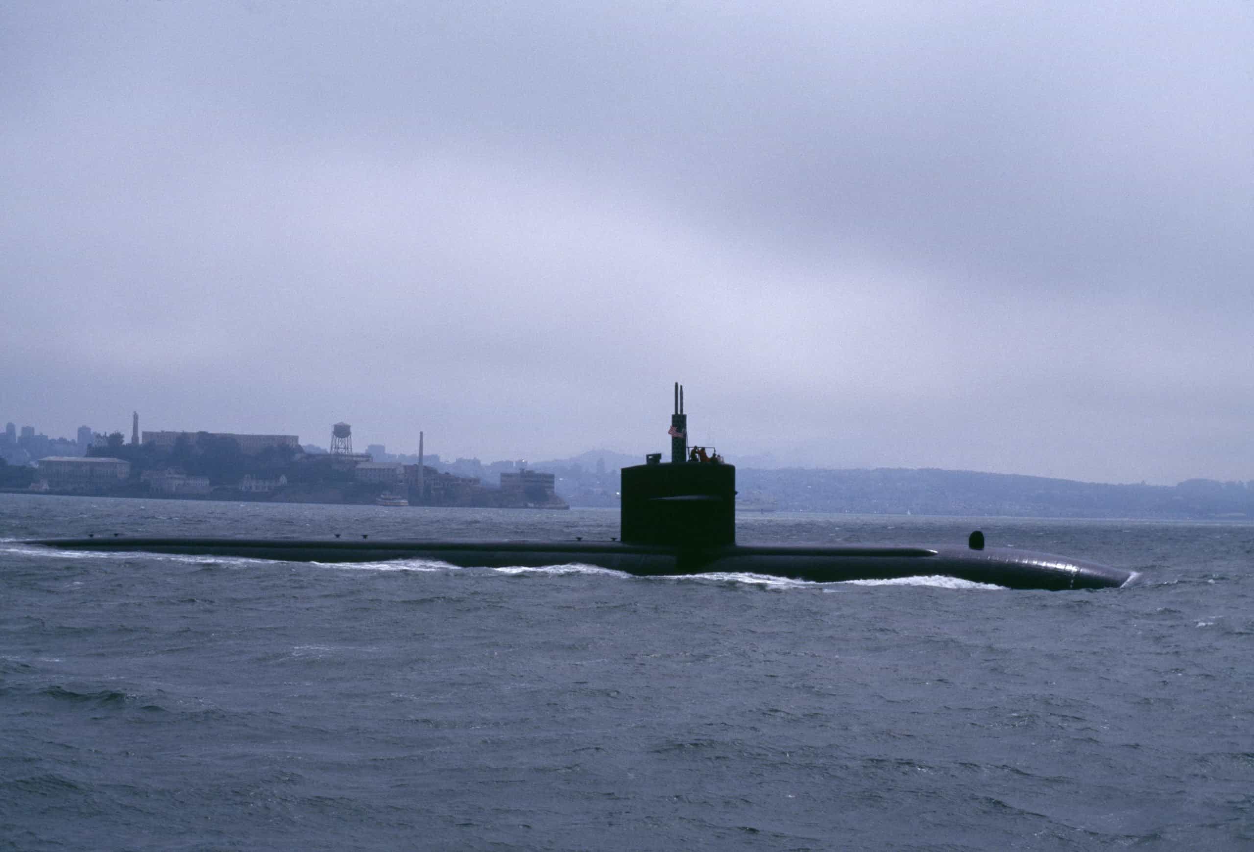 nuclear Submarine us navy | submarine slipping out to sea under fog San Francisco Bay