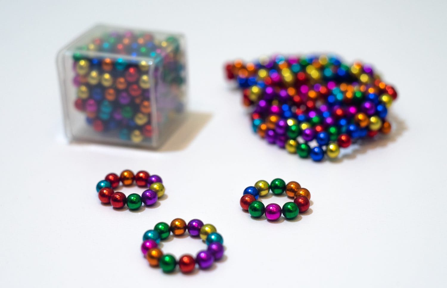 Magnetic colorful balls on the table.Toys for the development of fine motor skills.Magnetic constructor.