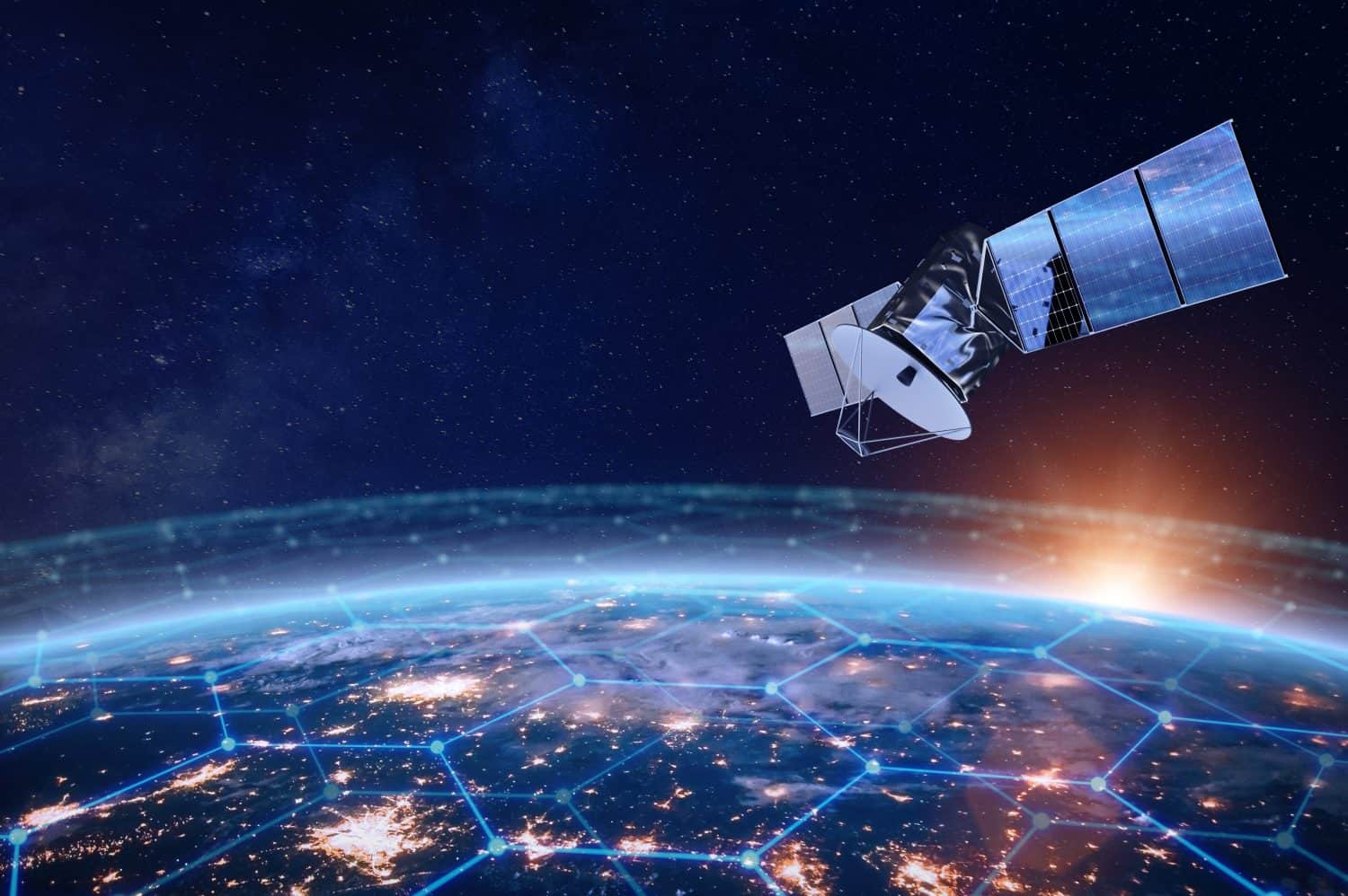 Telecommunications satellites providing global Internet and high-speed data communications over Europe. Satellite in space, low earth orbit. Global data communication technology.