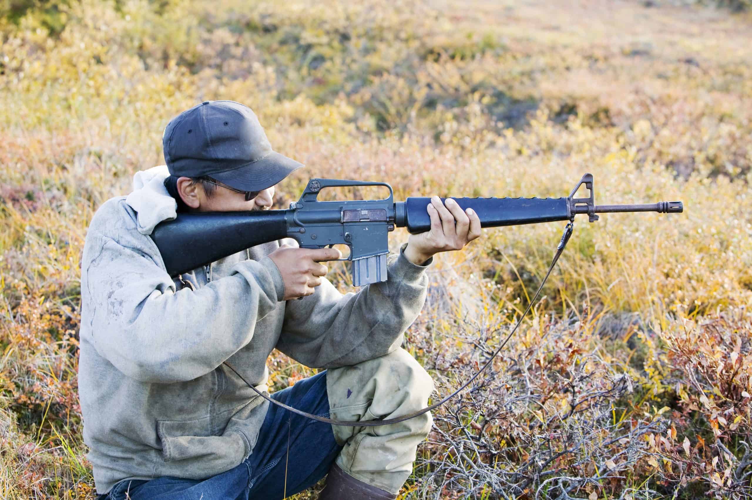 J J Weyouanna hunting Caribou on the tundra at the mouth of the sepentine river near Shishmaref a tiny island between alaska and siberia in the Chukchi sea.