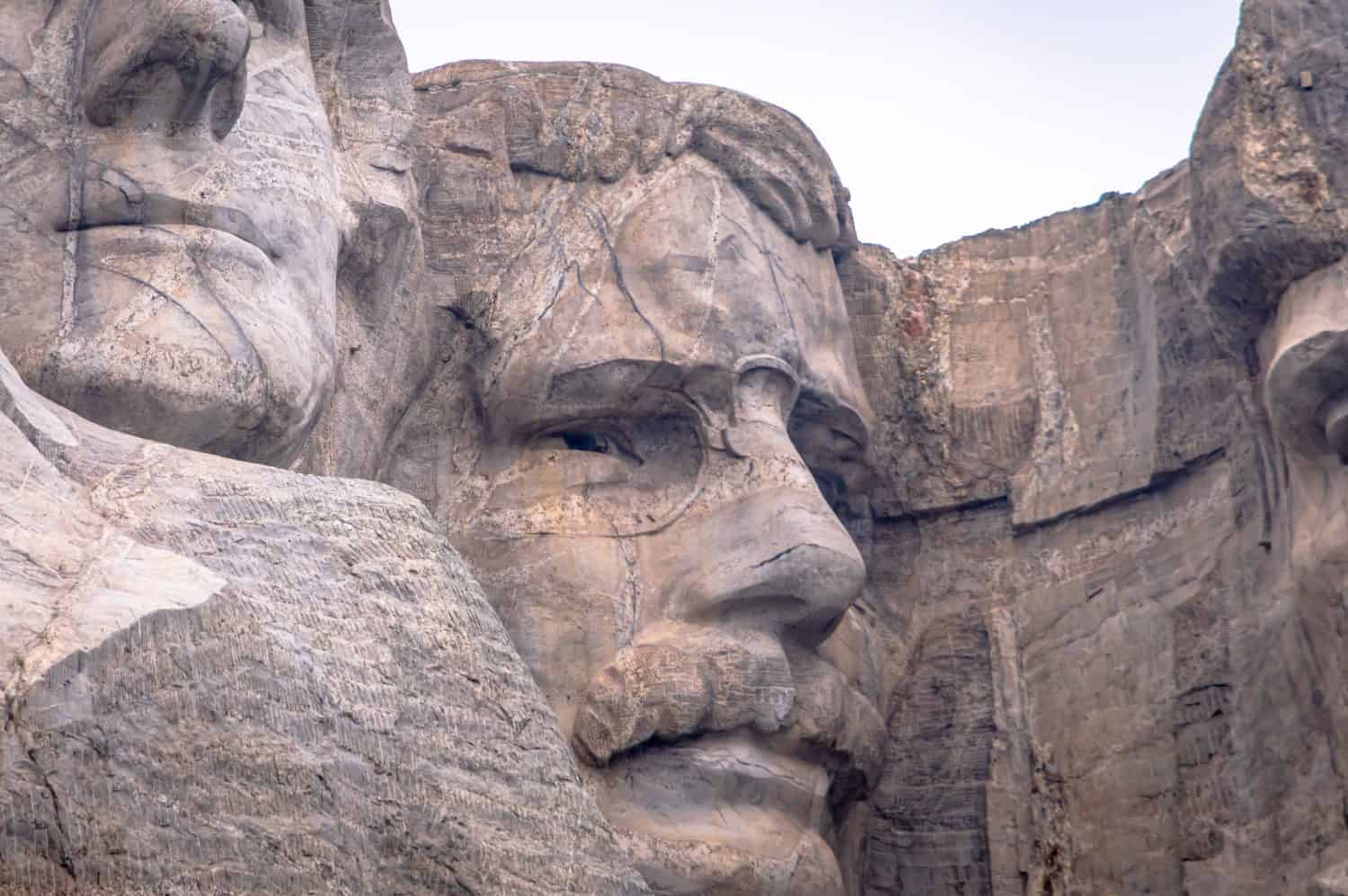 A close-up of Theodore Roosevelt, one of four presidential profiles atop Mount Rushmore in the Black Hills of South Dakota