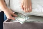 QYLD Holders Left $56,700 Per $10,000 on the Table Chasing Twelve Years of Monthly Income