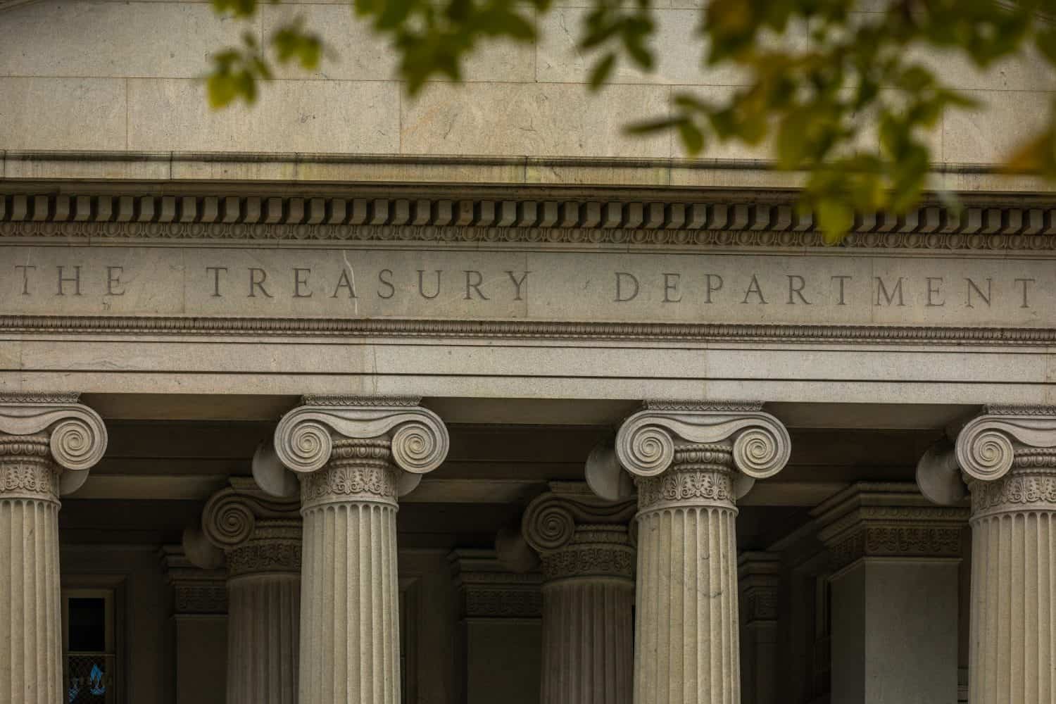 Lettering "The Treasury Department" on the Facade of the United States Treasury Department Building in Washington, DC - USA