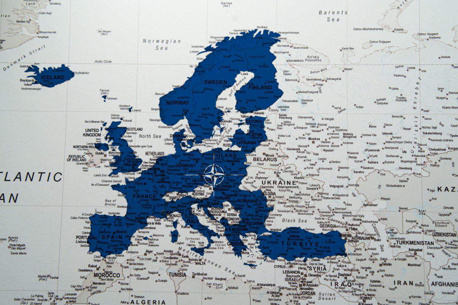 NATO alliance flag on Europe map. North Atlantic Treaty Organization. High quality photo