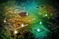 A close-up, high-angle shot of a green printed circuit board (PCB) with various electronic components. White, glowing lines arc between illuminated points on the board, suggesting data flow or network connections. The background features a vibrant green and yellow gradient, highlighting the intricate circuitry.