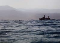Naval military ship patrols the Red Sea