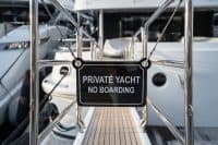 Private Yacht No Entry sign of a superyacht on a dock