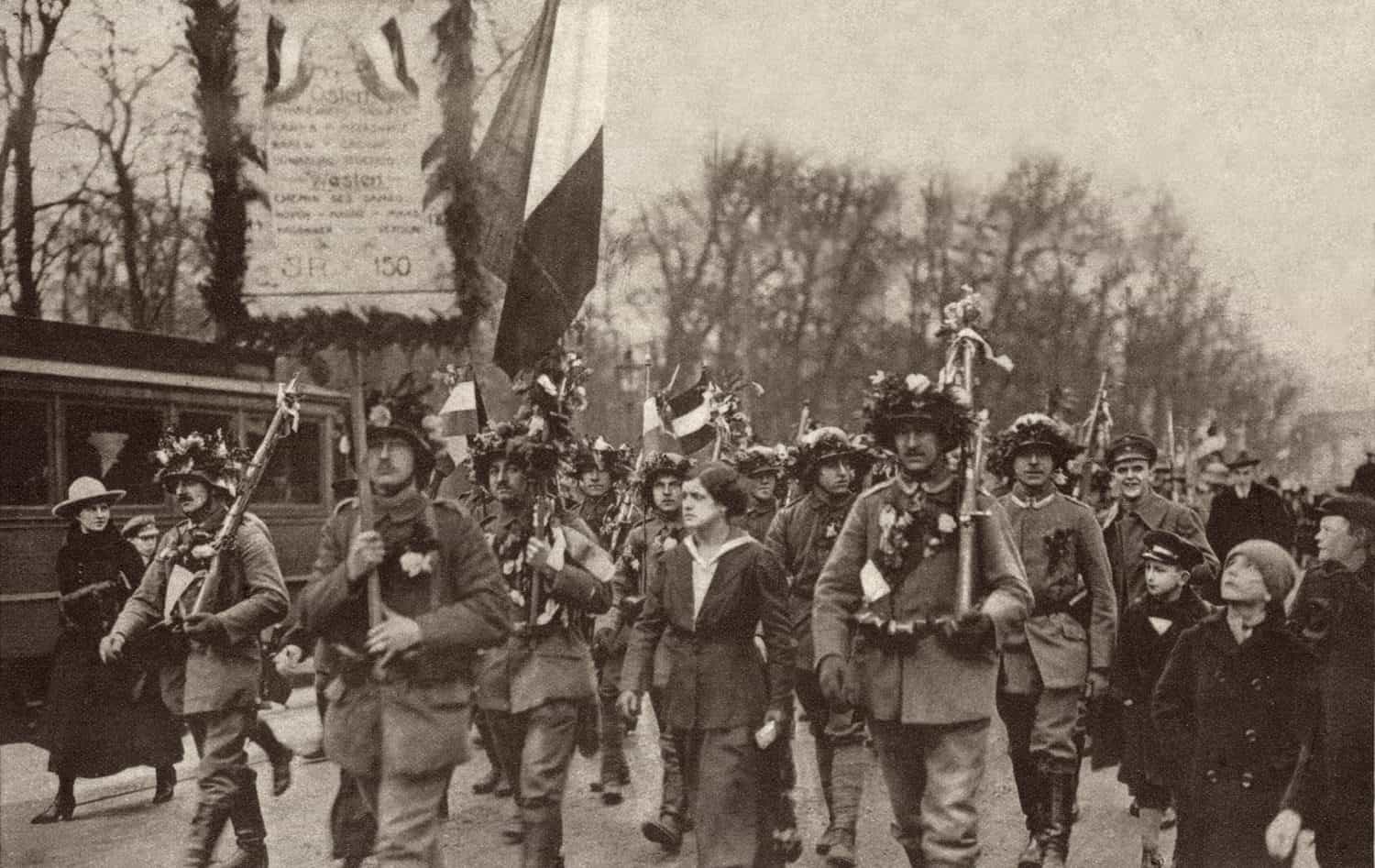 German soldiers welcomed home from World War 1. 1918. Berlin mothers, wives, and children met the soldiers arriving home from the war.