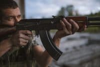 Man shooting with AK-47