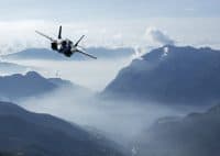 F-35 Army Fighter  jet flying over mountains