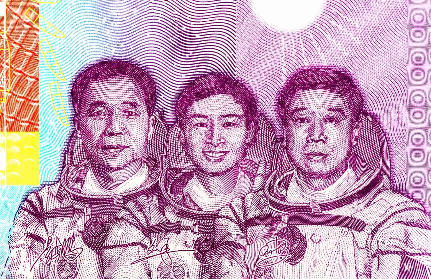 Portrait from China Tiangong-1 Aerospace Collection bank note. Chinese commemorative banknote 1 anniversary, 2 years, 10 years of Shenzhou 9 space flight, China bank notes.