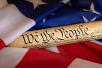 American flag blended with the United States Constitution for use as a symbol of laws, freedom and separation of government powers.