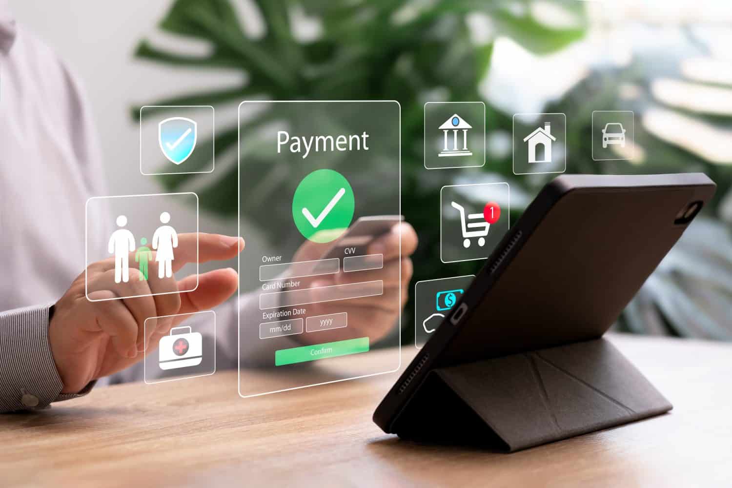 Digital banking Secure online payments concept, Businessman use tablets for financial transactions, Online shopping, Health, insurance, Home and car instalment to Payment via mobile banking apps