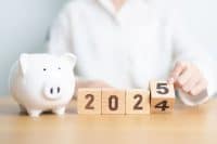 2024 end year to Happy New Year 2025 with piggy bank. Resolution, Goals, Plan, Action, Money Saving, Retirement fund, Pension, Investment and Financial concept